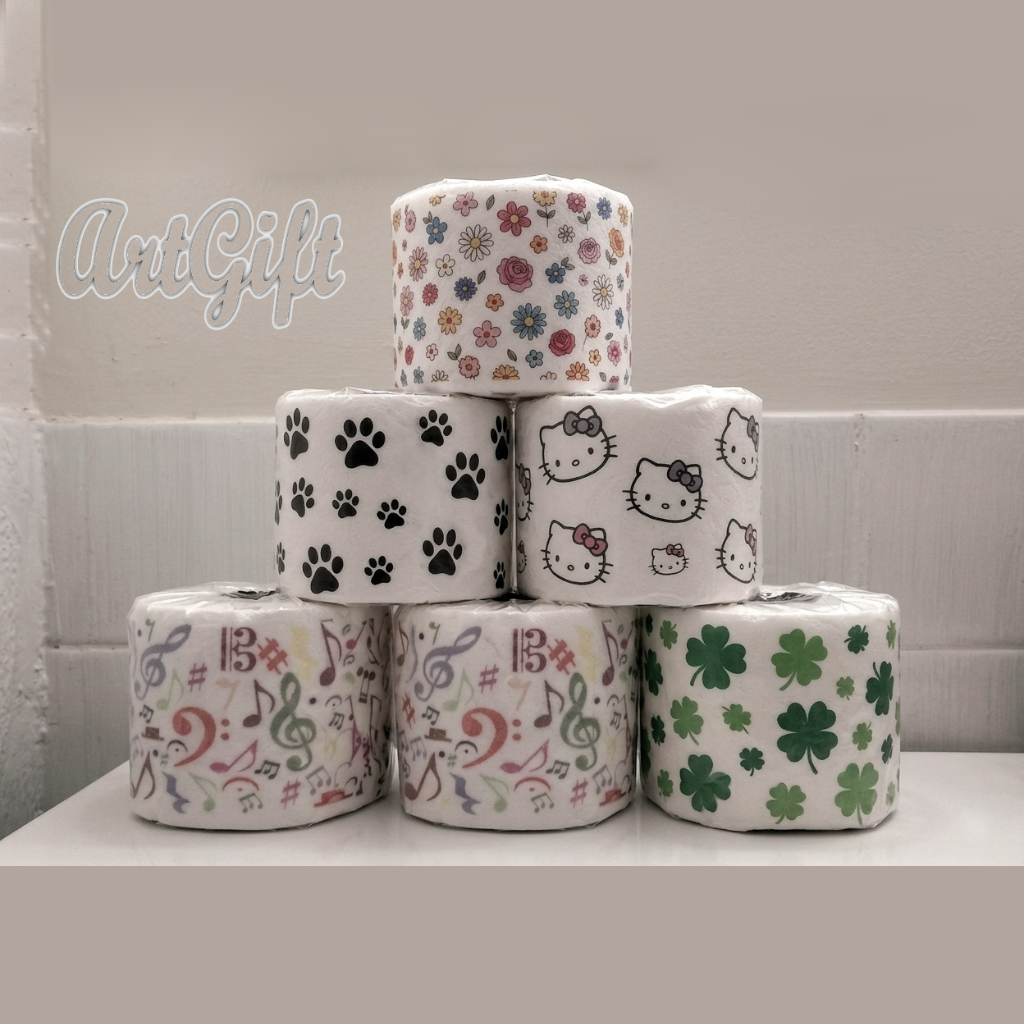 Caja de WC decorada con rollos de papel higiénico decorado con varias imágenes